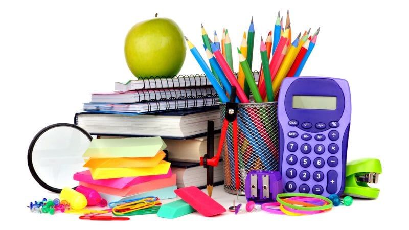  a stack of various school supplies arranged aesthetically 